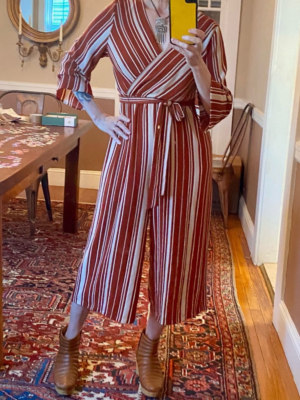 Striped jumpsuit with palazzo pants and wrap top